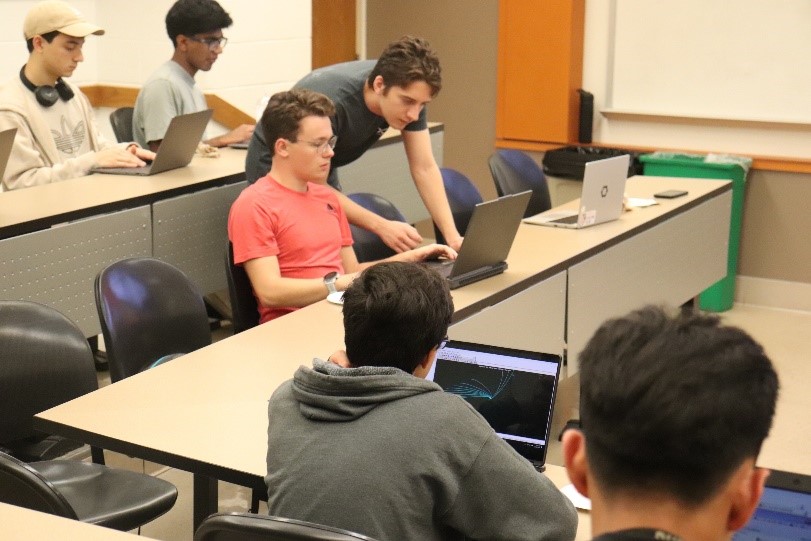 ASA Workshop Photo Students sitting at desks working on laptops